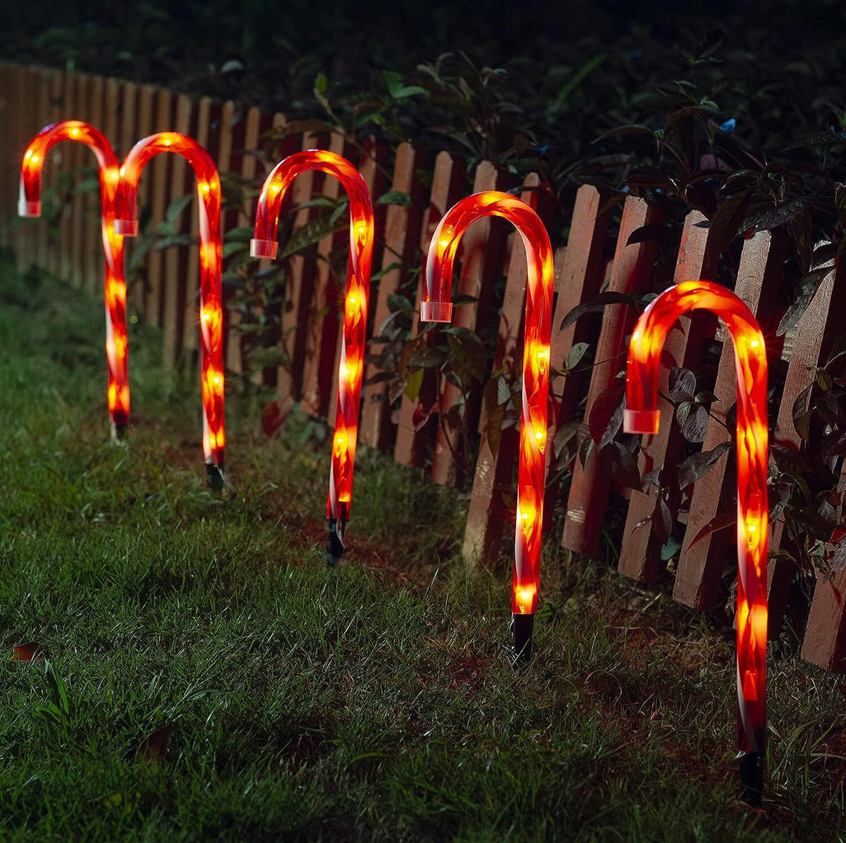 Candy Cane Outdoor Landscape Lights along fence